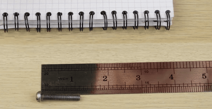Measuring a thread with a ruler
